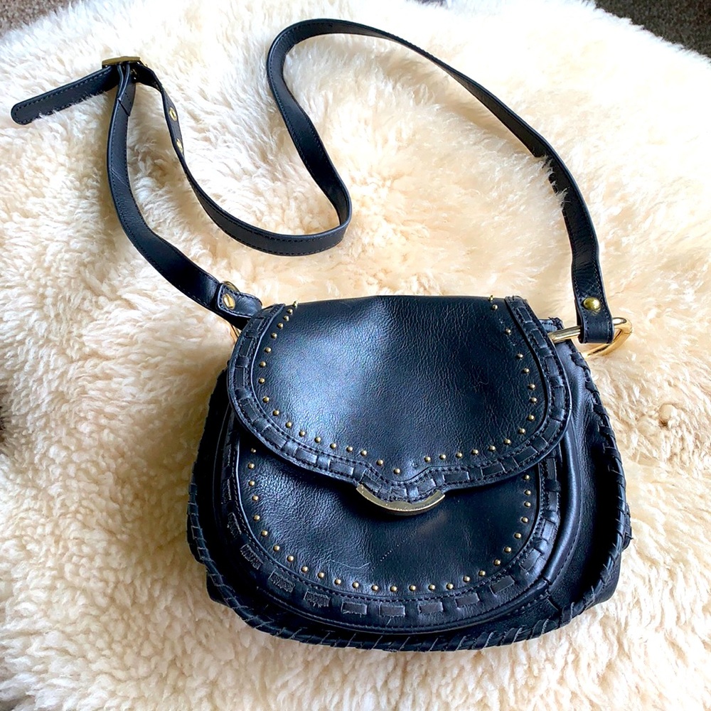 Black Cynthia Rowley studded shoulder bag.